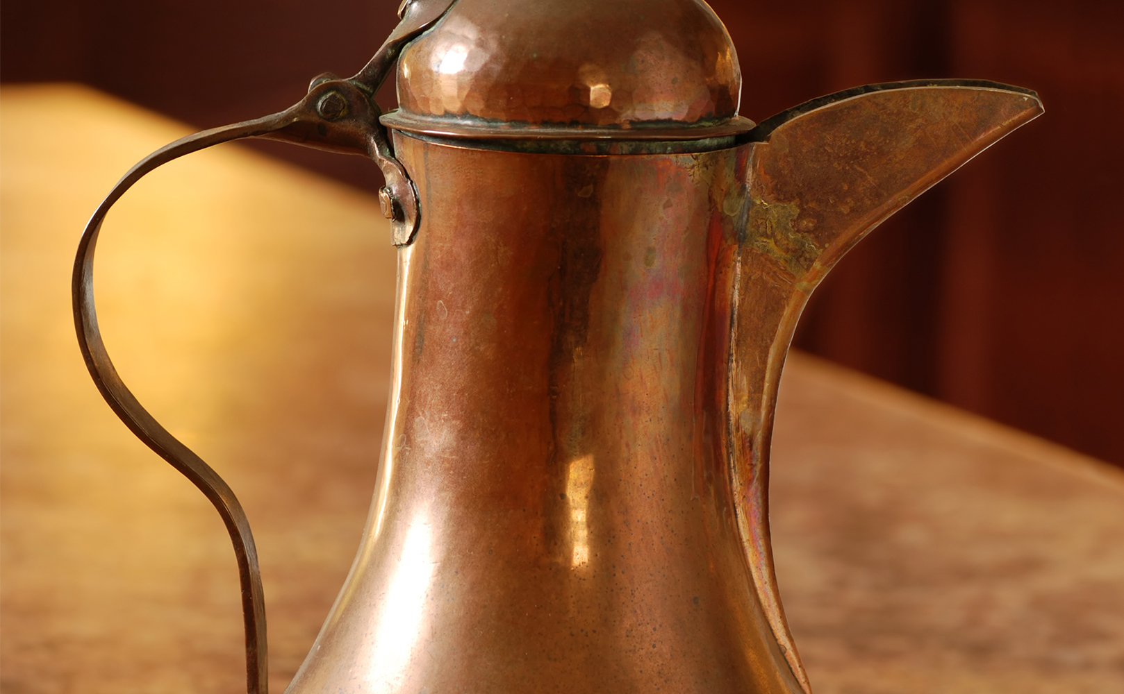 old copper pitcher