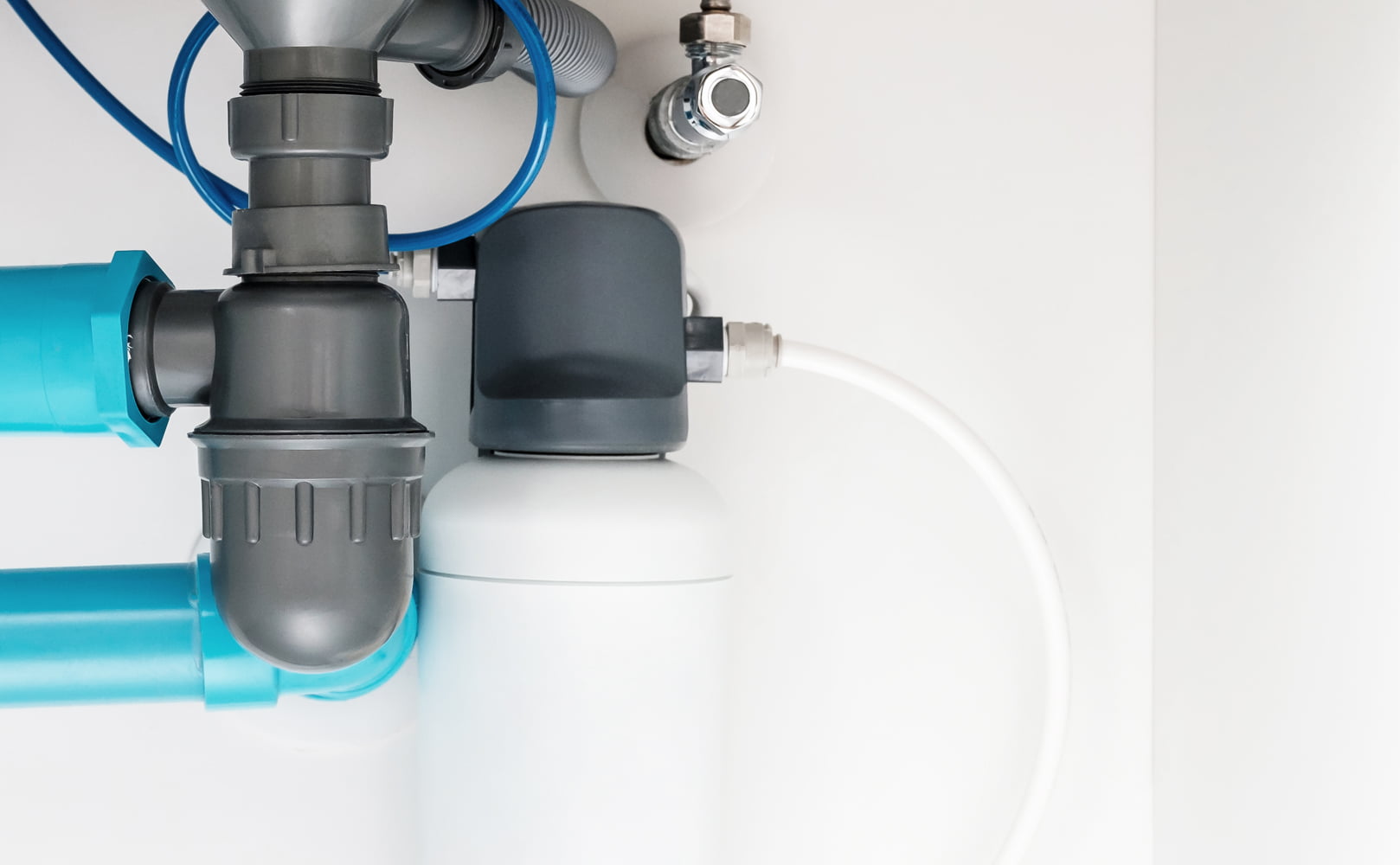 inline water filter installed under kitchen sink